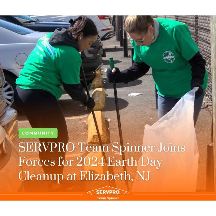 SERVPRO Team Spinner volunteers picking up trash in a parking lot